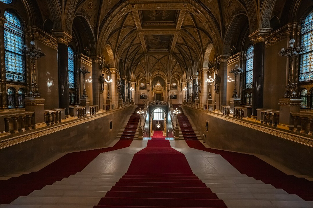 Red carpet event with photographers and bright flashes